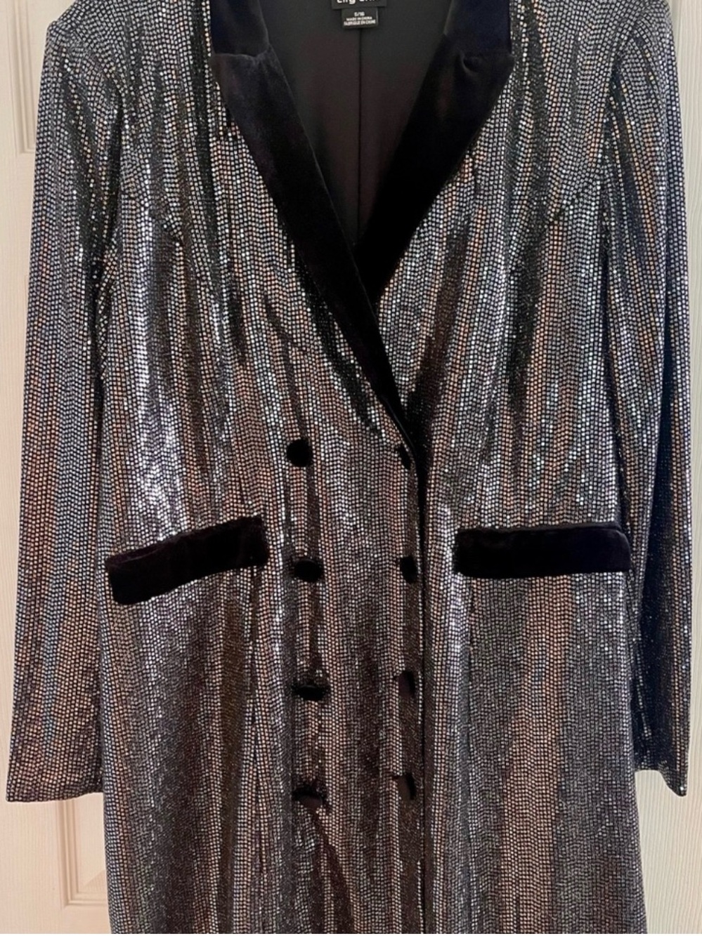 Silver Sequin Long sleeve dress. Velvet lapel.